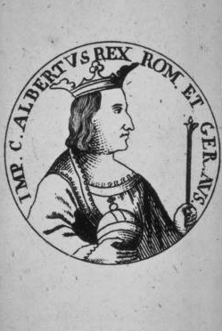 艾爾布雷特的肖像，拉丁文縮寫的意思為「皇帝蓋屋斯阿爾貝圖斯，羅馬人和日耳曼奧地利的國王」。